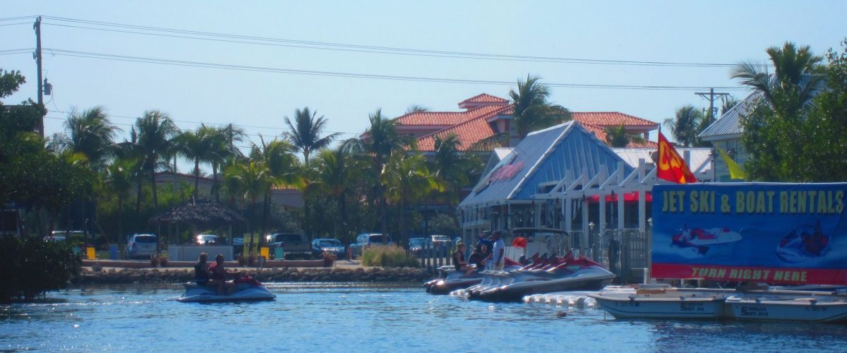 a small boat in a body of water