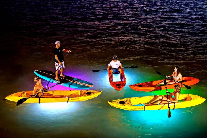 a group of people on a kayak in the water