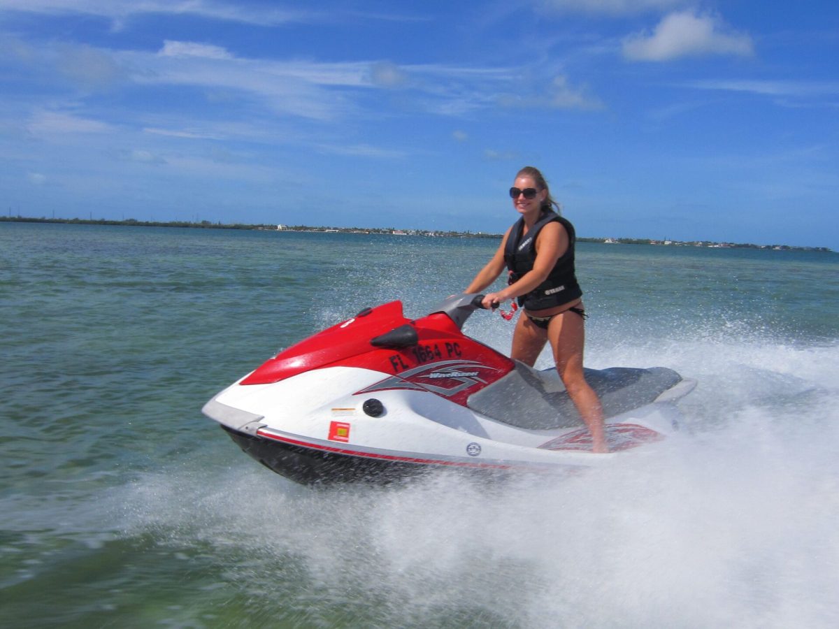 a man riding a wave on top of a body of water